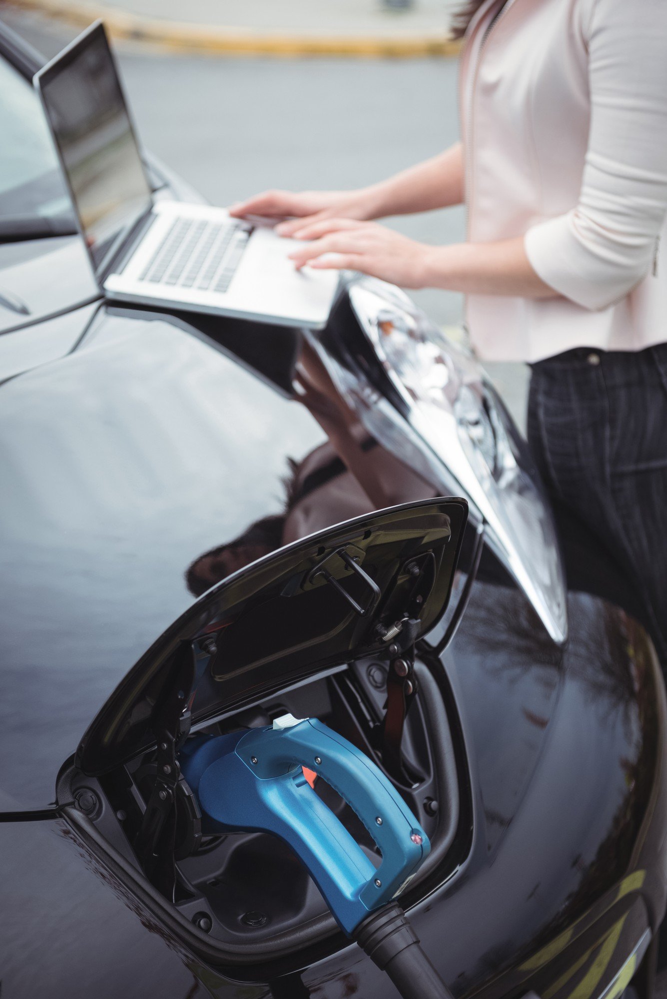 EV charging port and onboard charger service for electric vehicles